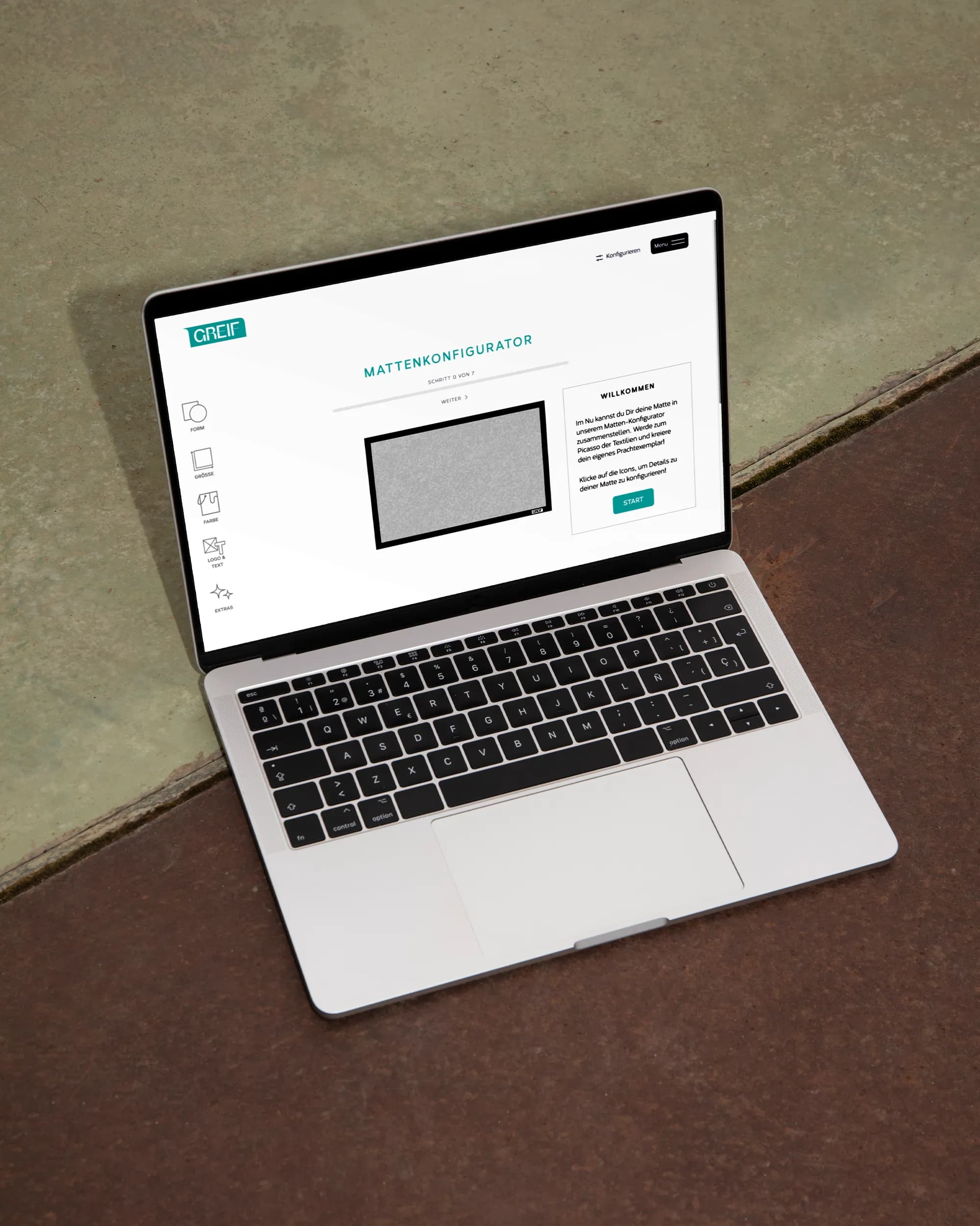 Laptop zeigt den Online-Konfigurator für Logomatten von Greif